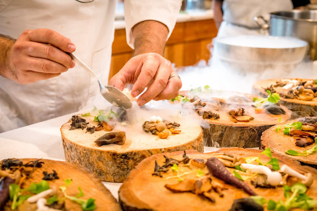 Chef preparing mushrooms