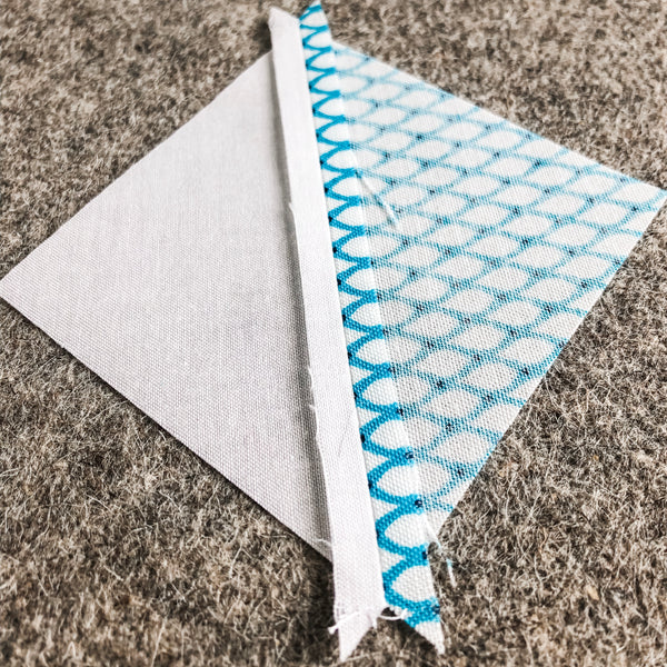 Honest review of the Project Wool Pressing Mat by Julie of Running Stitch Quilts.