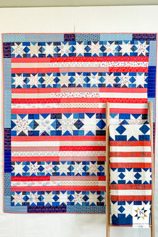 Snowflakes in July by Julie Burton of Running Stitch Quilts, the scrappy variation. 