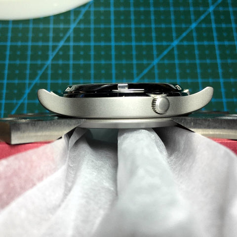 SEIKO SNK809 on Watch bezel remover tool with its blades in the gap - Tutorial on How to modify your SEIKO Bezels and Bezel Inserts by Lucius Atelier