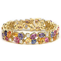 colored gemstone bracelet in gold