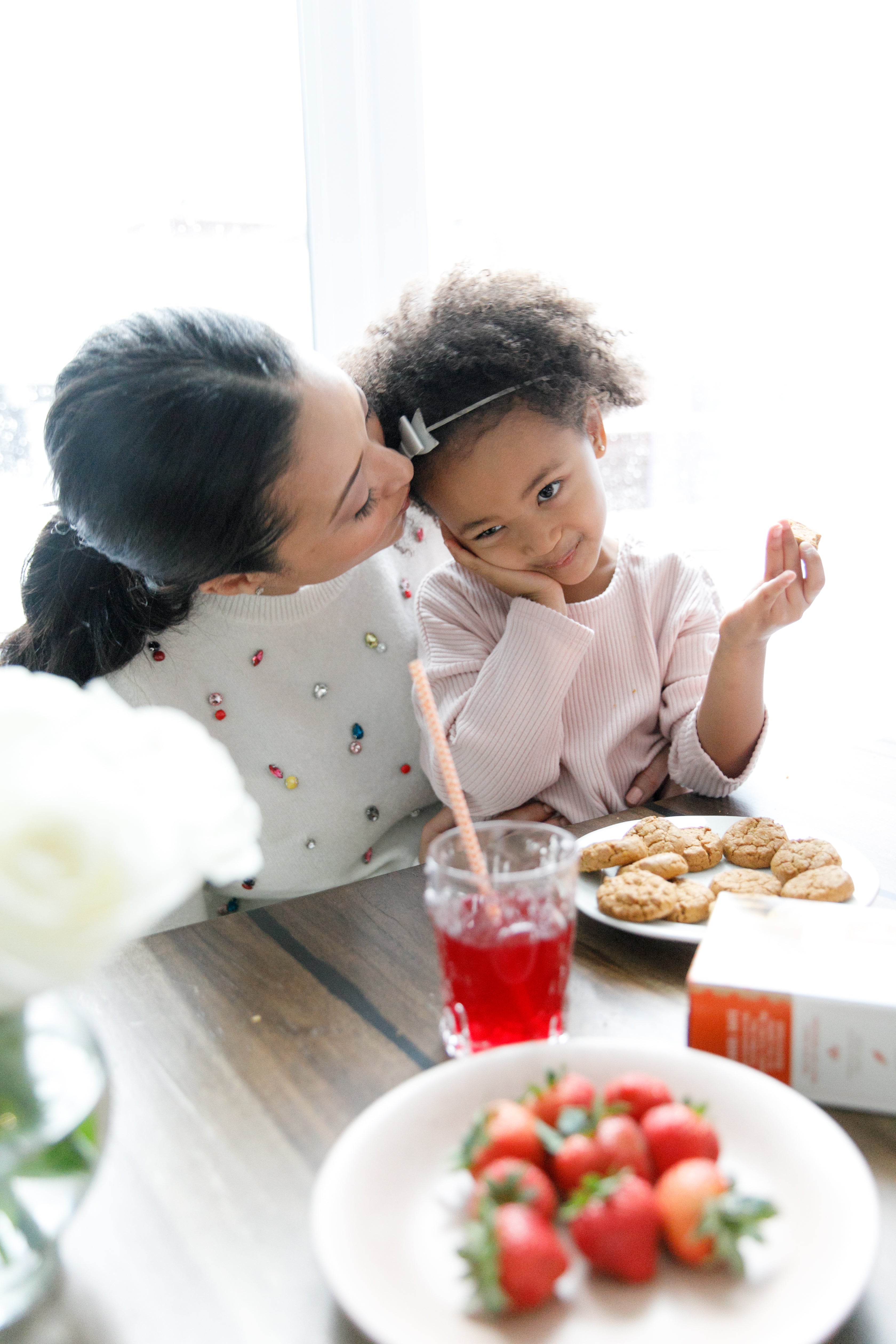 Denise and Vivi Enjoying Snack Time Together