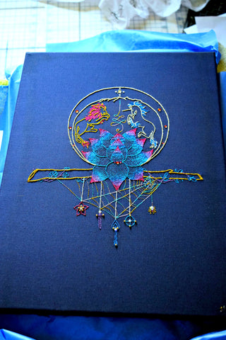 Embroidered talisman 'Journey' on navy fabric with metallic threads