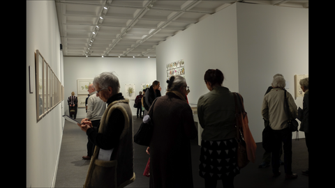 Exhibition with crowd of people at Lawrence Wilson Gallery Perth