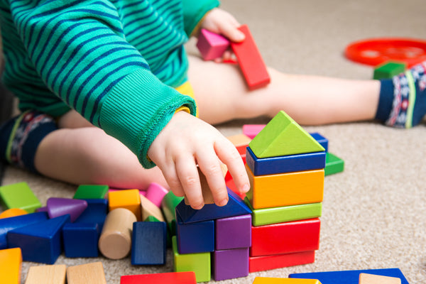 kids playing building blocks