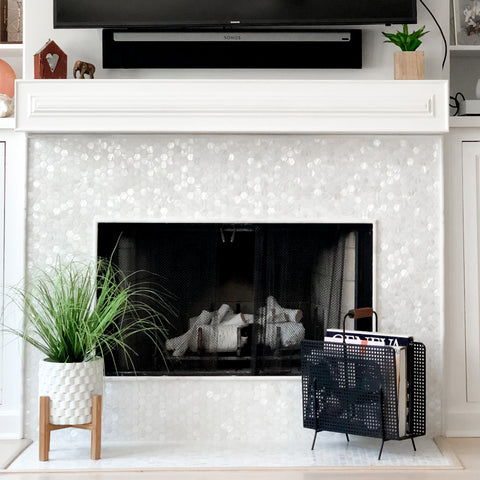 Mantle with mother of pearl tile