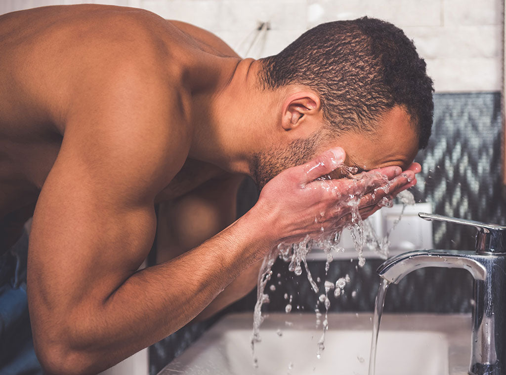 Man Washing Face