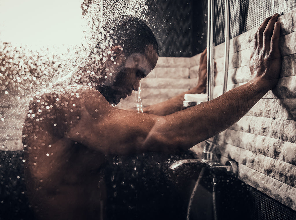 Man taking a shower with a beard