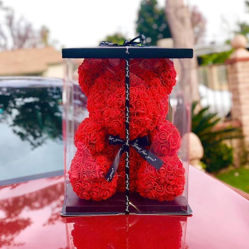 a teddy bear made of roses