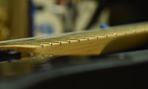 Sides of the fingerboard after the Plek Process
