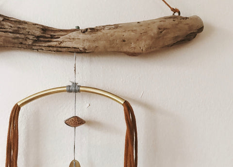 driftwood and brass sculpture and wallhanging