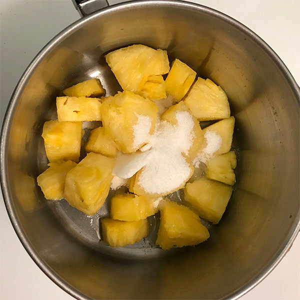 chopped pineapple in sauce pan
