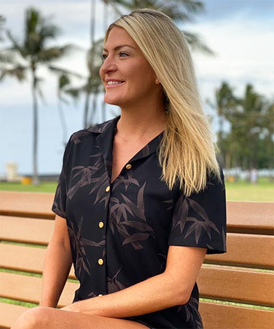 Loryn relaxing in a black Bamboo Garden Hawaiian shirt