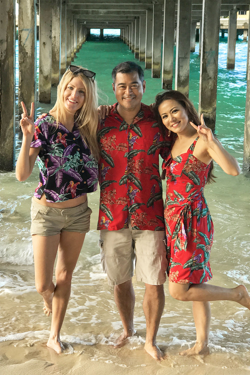 Magnum PI shirts and dress under a pier