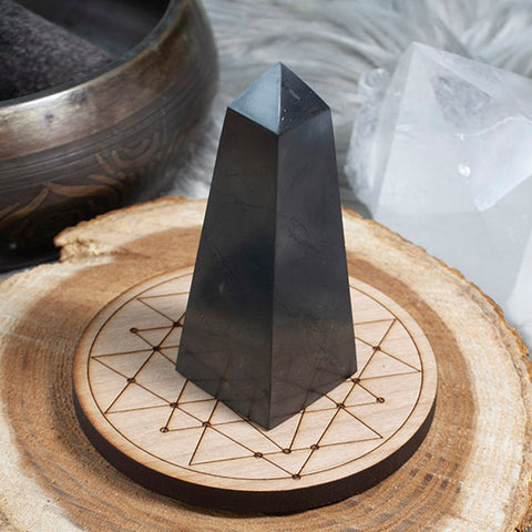 ic:While the aesthetic can be tempting, polished shungite should never be used in a gem elixir bottle or to purify water.  Raw shungite is the only acceptable form to purify water.