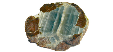 ic:This picture, taken in 2005 by Marcelo Olsina, shows a half-polished slab of Chalcedony agate from Argentina.  This was taken 4 years before this mineral was trademarked “Lemurian Aquatine Calcite”