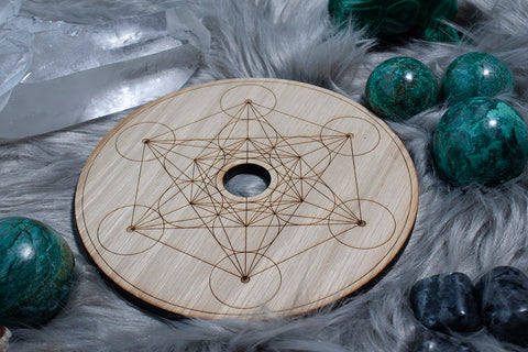 ic:This grid board is engraved with Metatron's Cube, a sacred geometry figure derived from the Flower of Life.