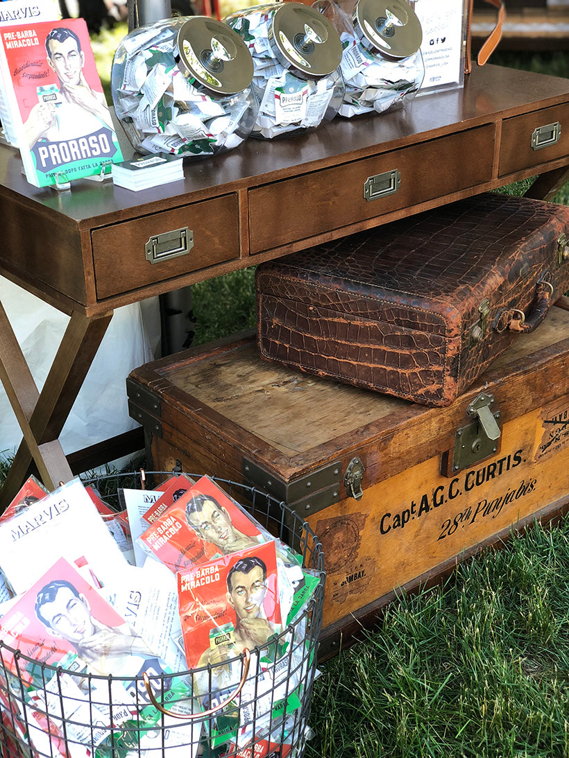 Proraso samples merchandised with vintage items in the mobile barbershop