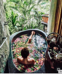 Girl in flower bath soak, Bali