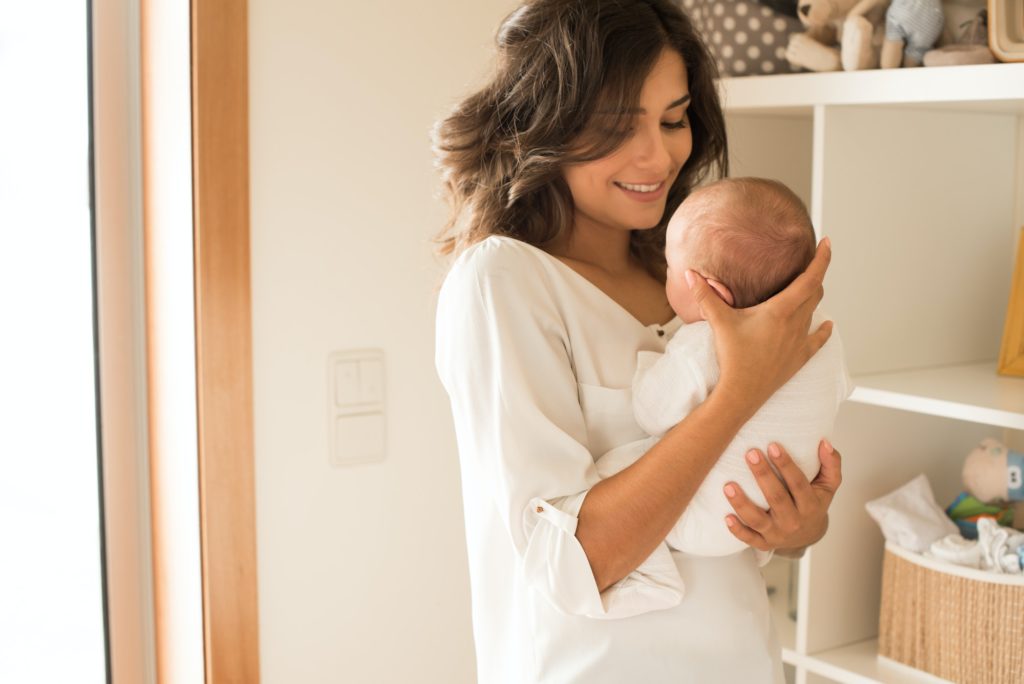 Woman with newborn baby