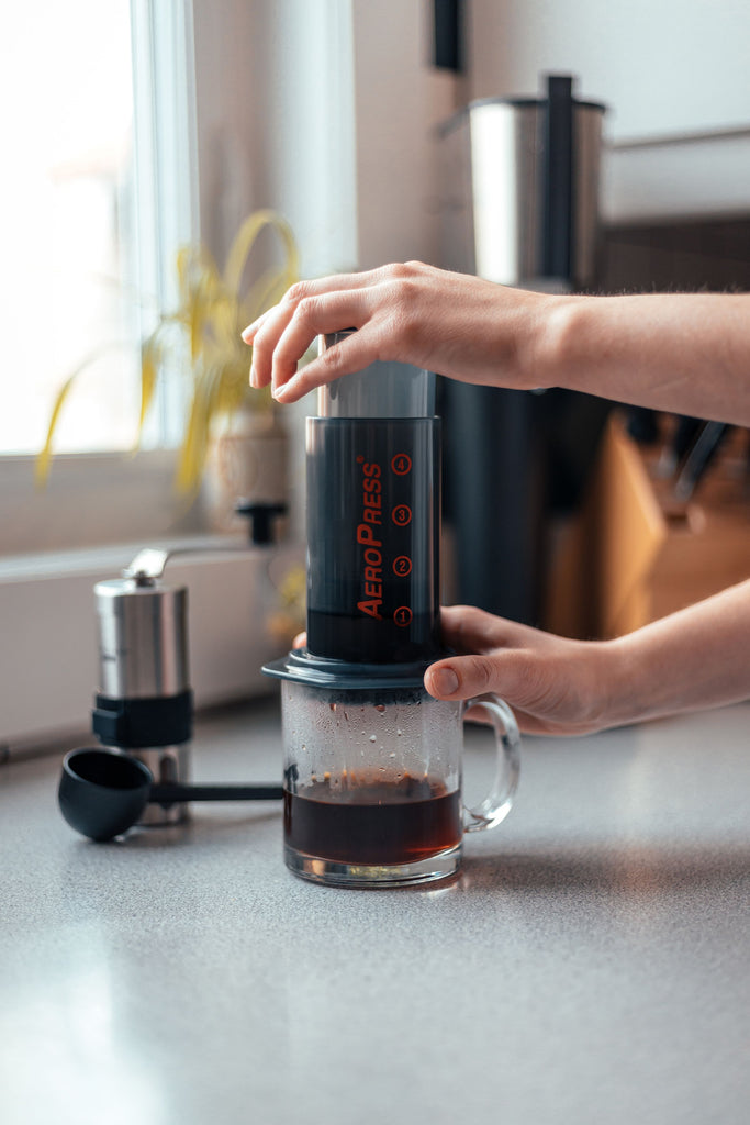 AeroPress being pressed in a kitchen