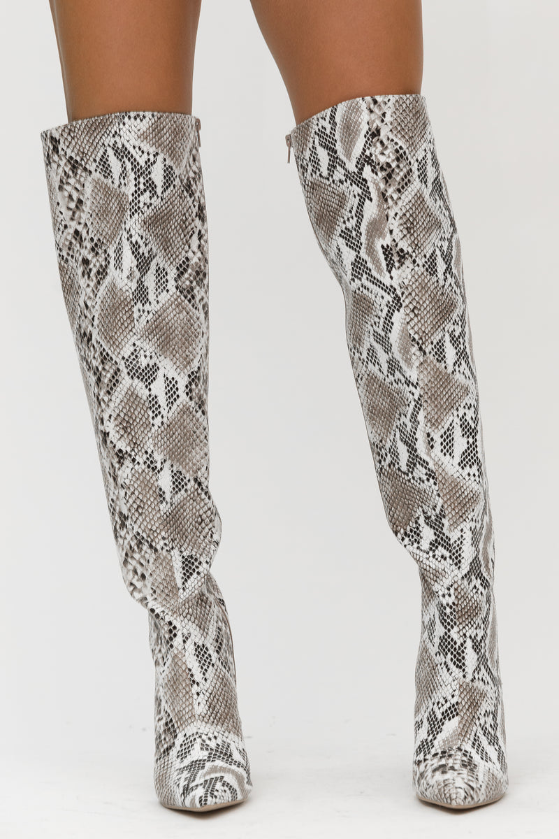 knee length snakeskin boots