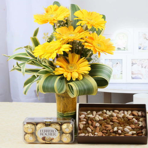 Yellow Gerberas Vase with Dry Fruits and Ferrero Rocher Chocolates