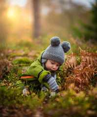 baby playing in nature 