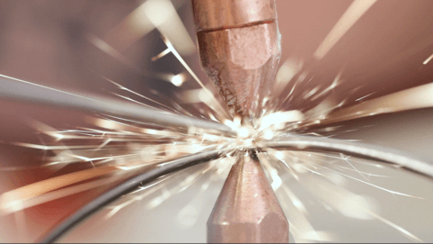 A man doing the welding to create a sturdy frame