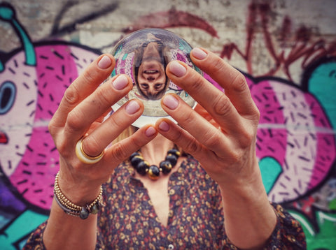 yaara holds a crystal ball