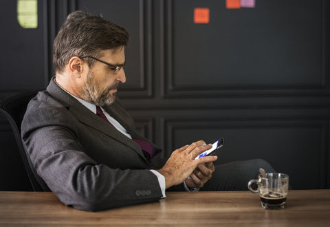 Businessman on phone wearing smart suit