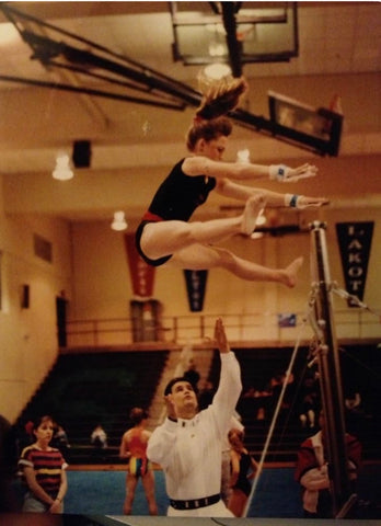 Gymnast on bars