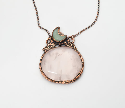 rose quartz calming worry stone with aventurine crescent moon
