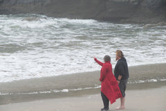 My son getting water for the ocean for his mom