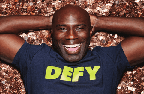 Image of Terrell Davis in a DEFY shirt.