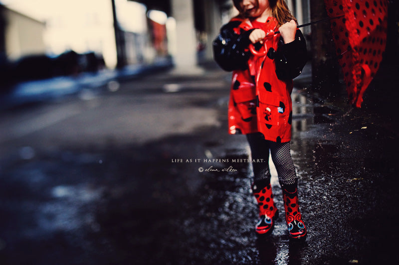 ew8-girl-in-raincoat-and-rain-boots