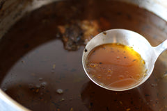 beef fat from stock ladle