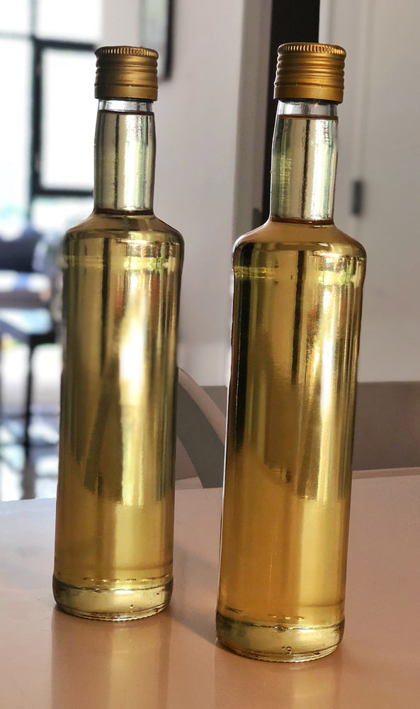 Bottles full of golden helichrysum