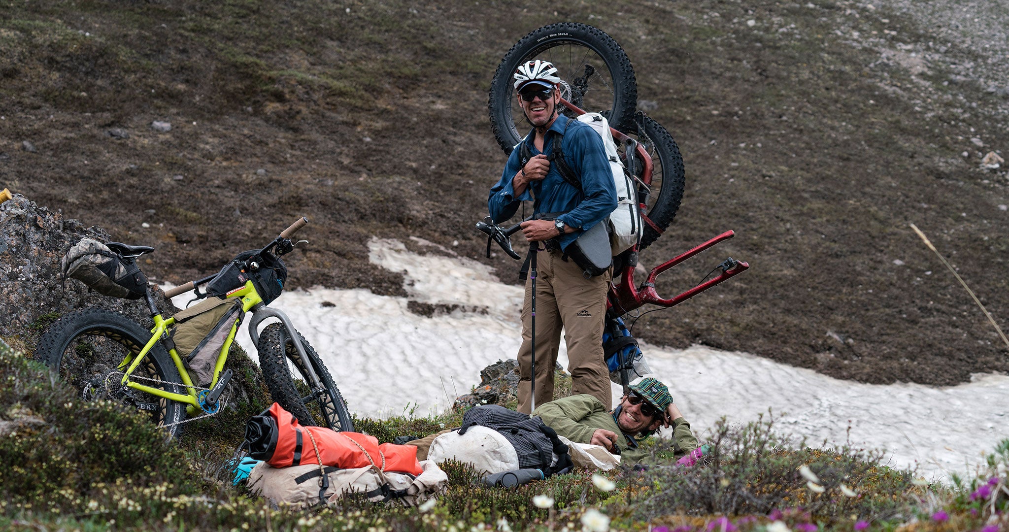 Ultralight bikepackers pose for the camera