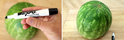 Watermelon with dry-erase marker outlining a mouth shape