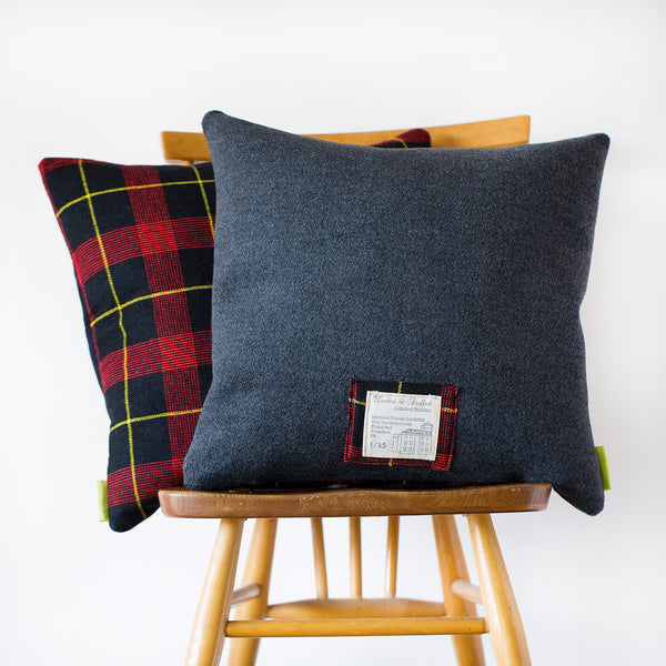 Grey wool gannex cushion with tartan back 