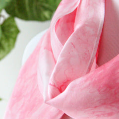 close up of pink silk scarf