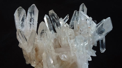 Cleansing Crystals on a Clear Quartz Cluster