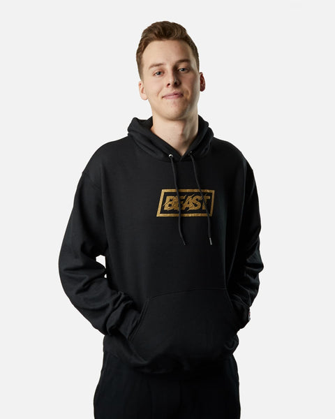 black champion hoodie with gold writing