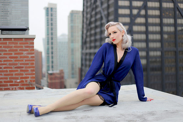 Rachel Ann Jensen wears an Angela Friedman blue silk robe with french lace lingerie