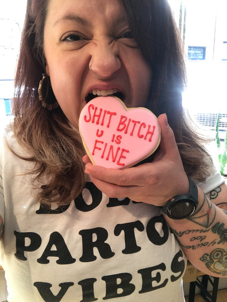Kat Lewis of The Free Bake eats a cookie 