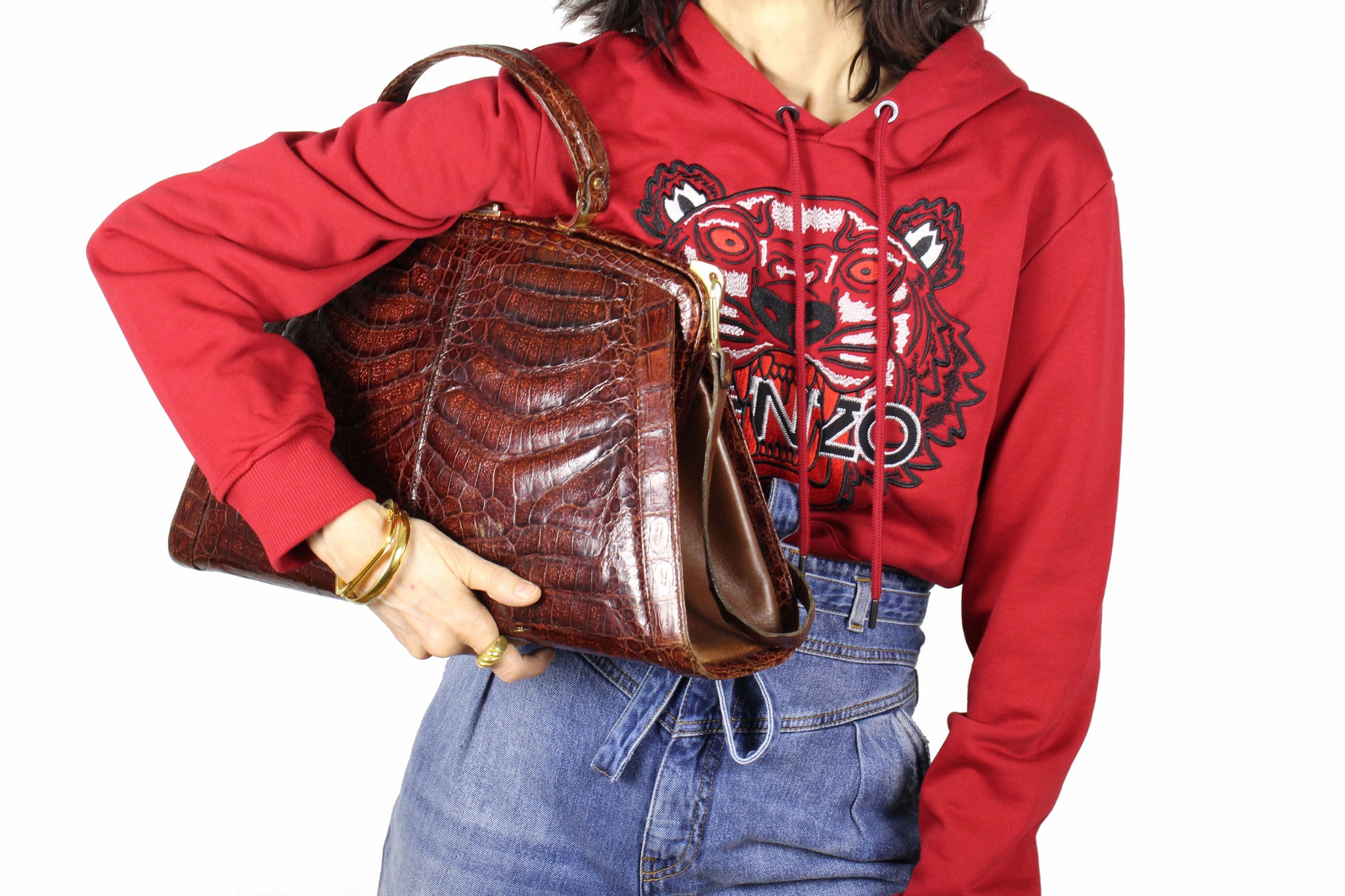 sizable reddish-brown crocodile skin handbag