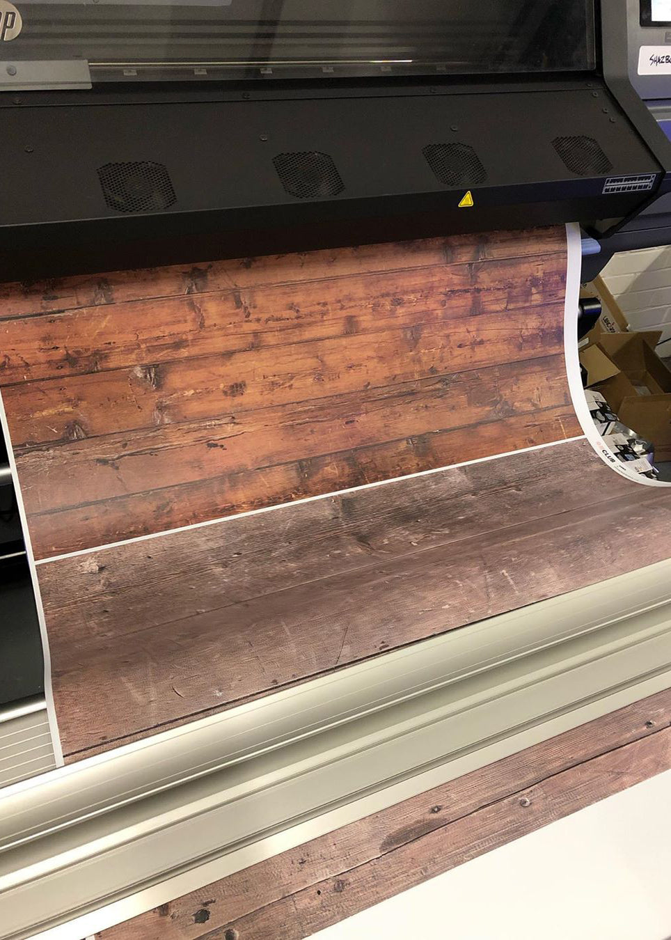 Wood textures printing onto vinyl at Club Backdrops