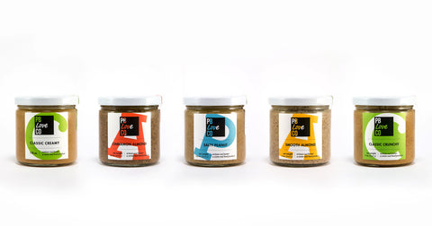 the pb love company full flavors. classic crunchy, classic creamy, salty peanut, cinnamon almond, smooth almond. handcrafted peanut butter and almond butter made in denver, CO.