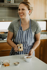 Chef JAM with a nice apron and a great smile. She makes peanut butter foods and almond butter foods. 
